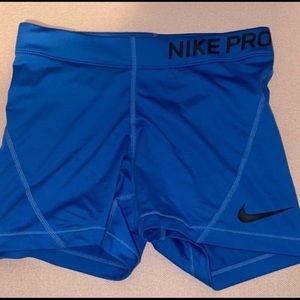 Blue Nike pro shorts